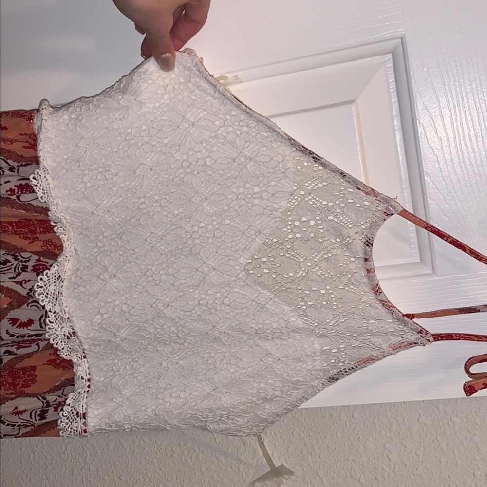 White lace dress with orange patterned bottom